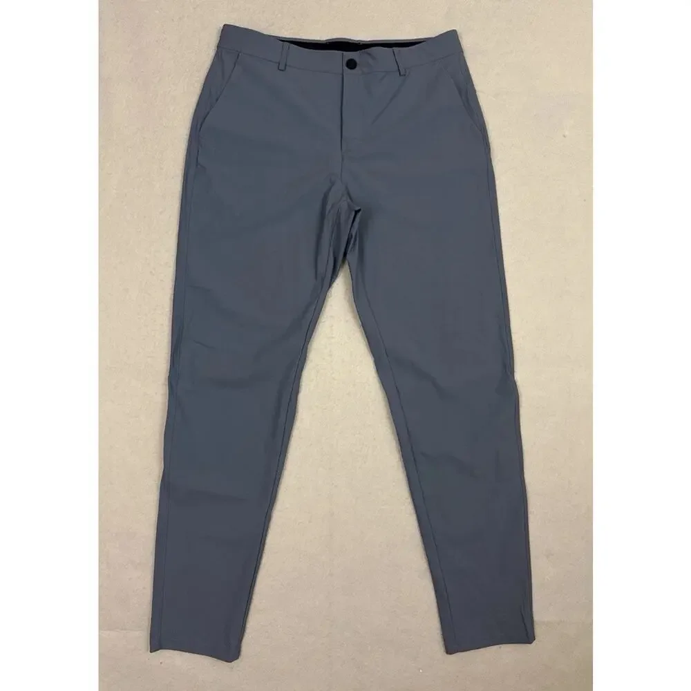 UNRL Concourse Golf Pants Mens Large 34-36 Tall Storm Blue Stretch Performance